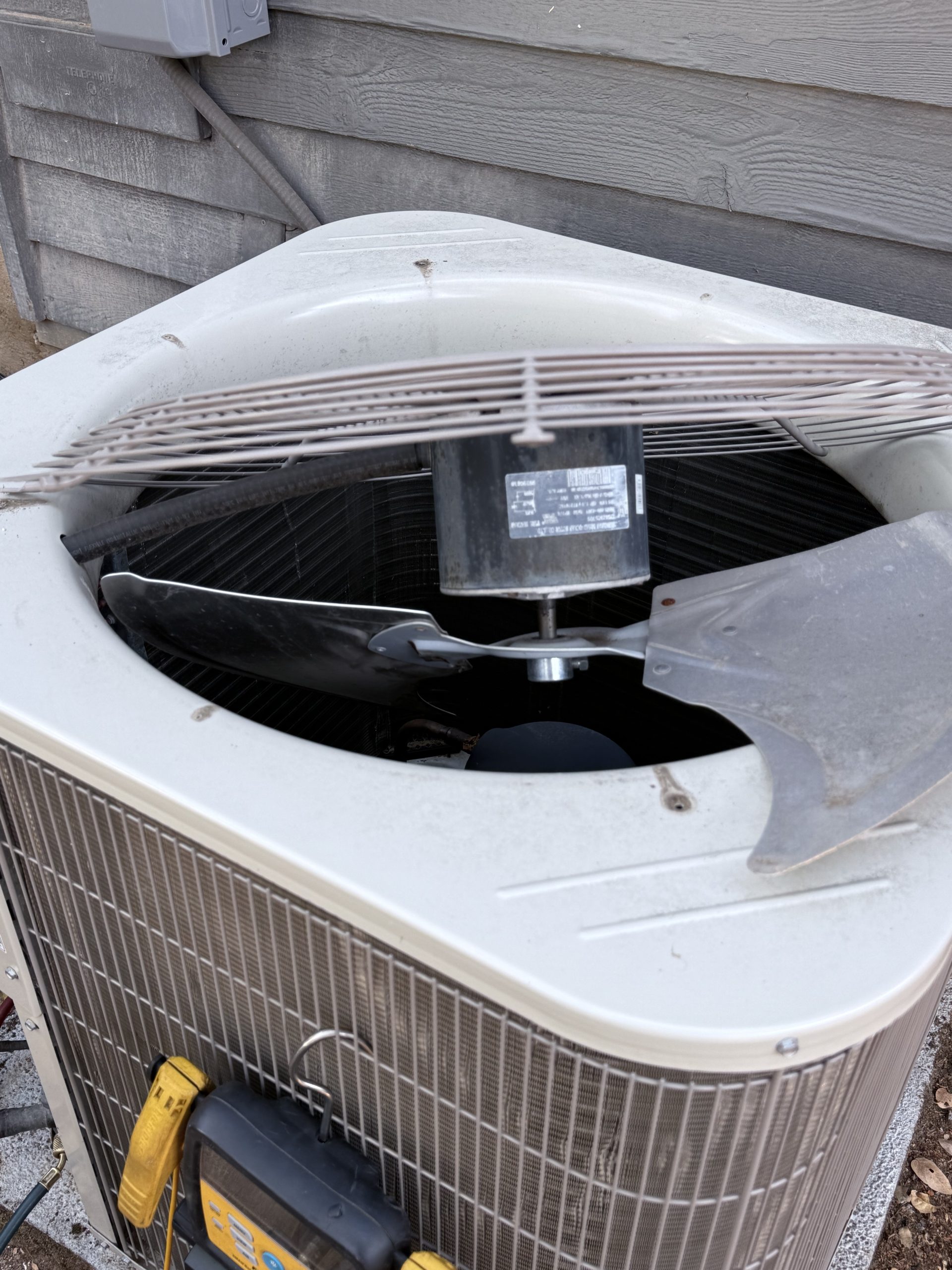 Auburn condenser fan motor replacement in progress