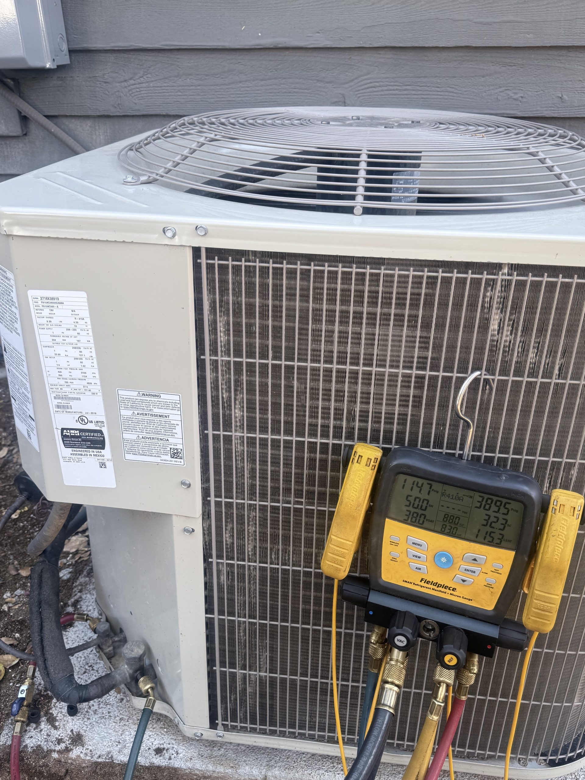 Auburn outdoor AC unit and diagnostic gauges