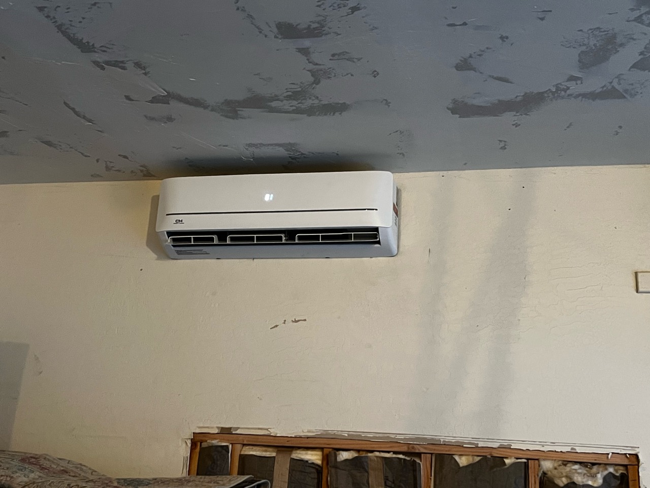 Wall-mounted Cooper & Hunter indoor mini-split unit inside the Auburn garage
